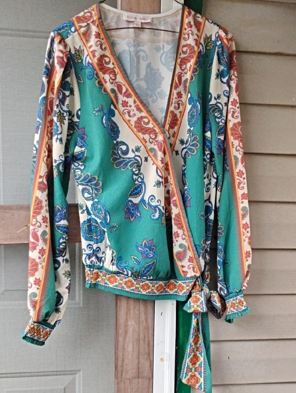 Flying Tomato Silky cream Faux Wrap top with pink logo,teal accents